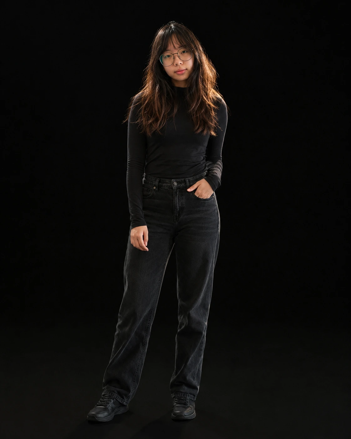 Sujen, co-founder of Lychee, against a dark studio backdrop.